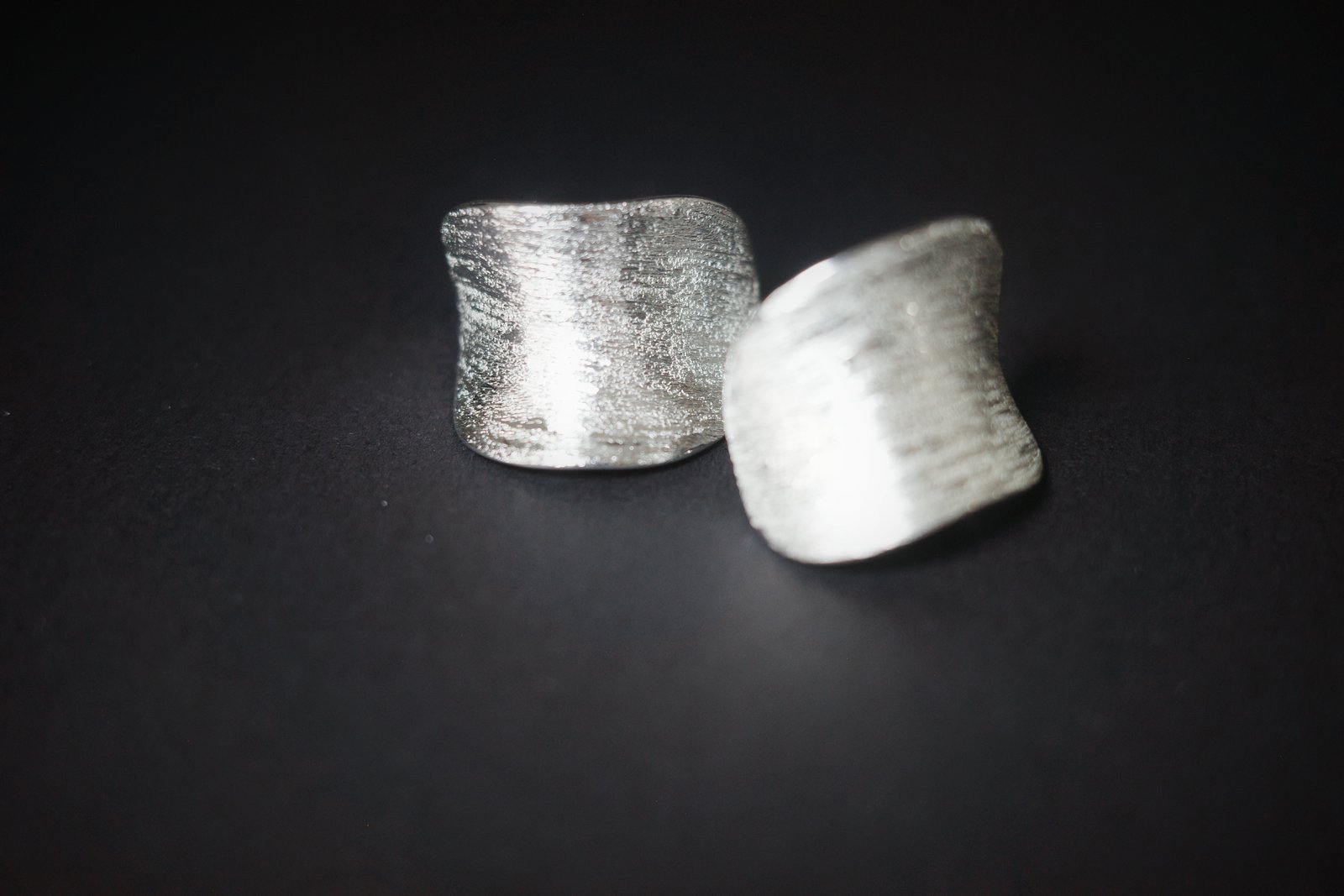 Distort 01 — folded loop earrings, product view